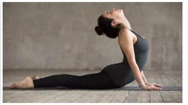 Performing Bhujangasana to strengthen heart muscles